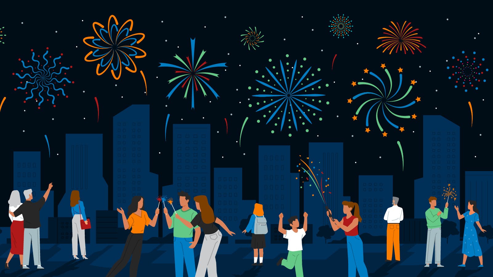 People in front of fireworks