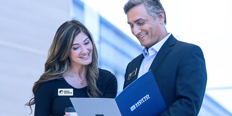 Loan originator and real estate broker in discussion
